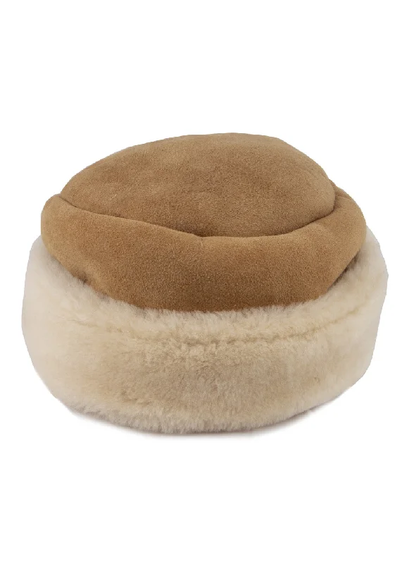 beanies with stylish accents-  Tudor Sheepskin Hat