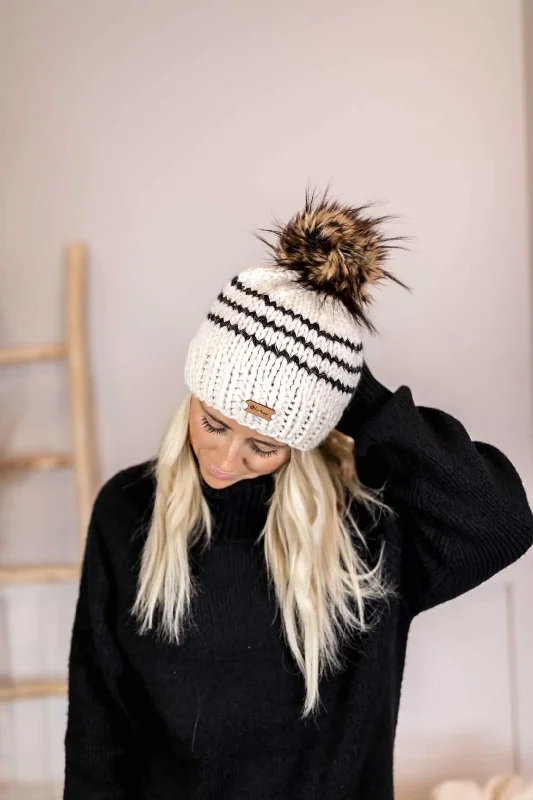 beanies with faux fur-  Adult Stripe Knit Pom Hat | Off White + Obsidian Black