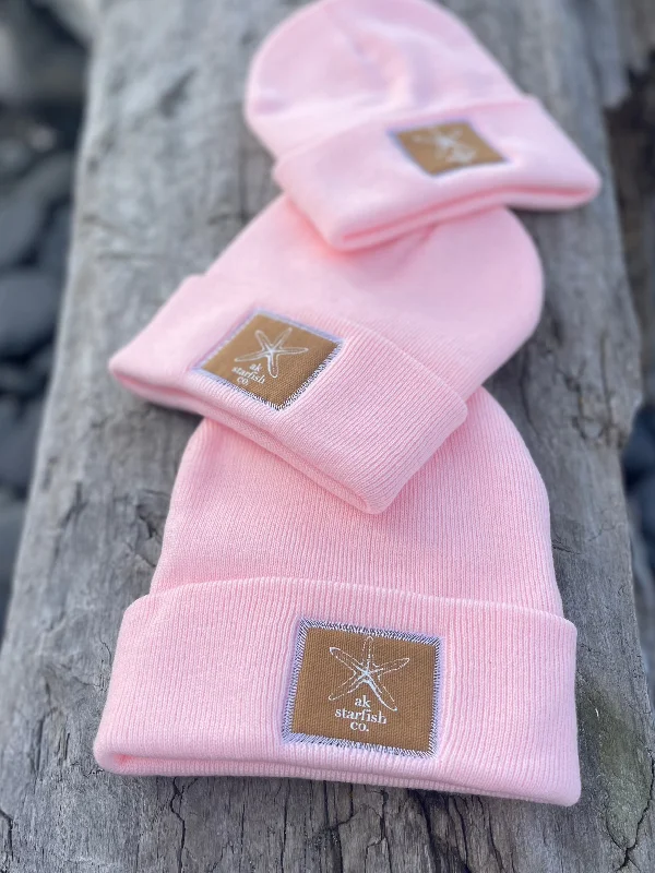 beanies for winter road trips-  Winter Pink AK Starfish Co. Patch Beanie $38.00